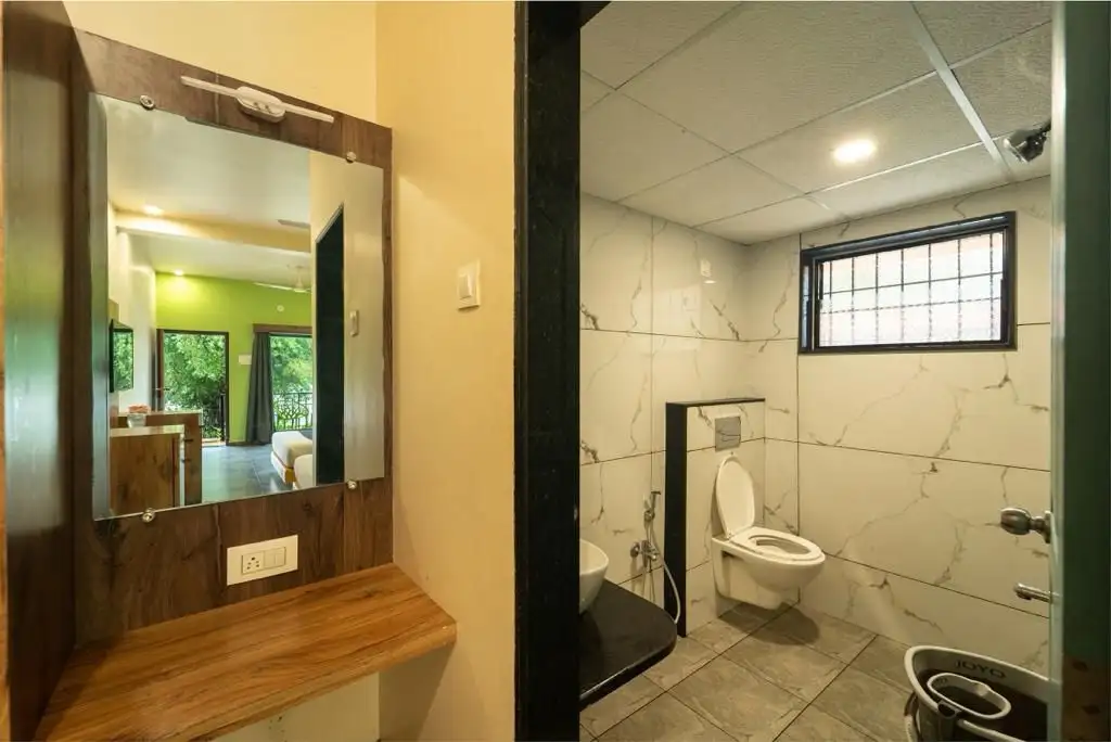 Open lawns and event space near river at River Edge Retreat